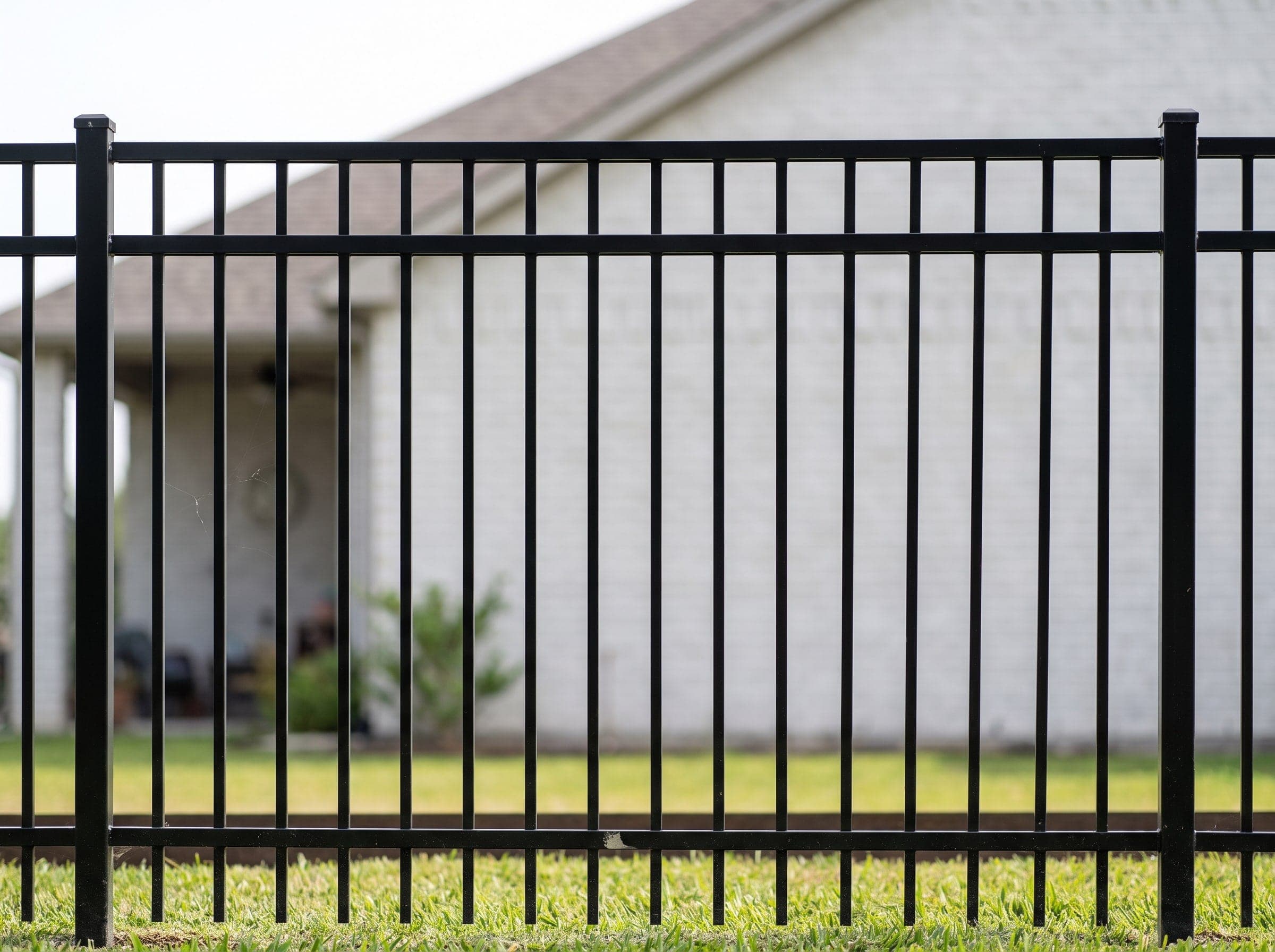 Ornamental steel and aluminum fence built by Johnson Services Company in Texas